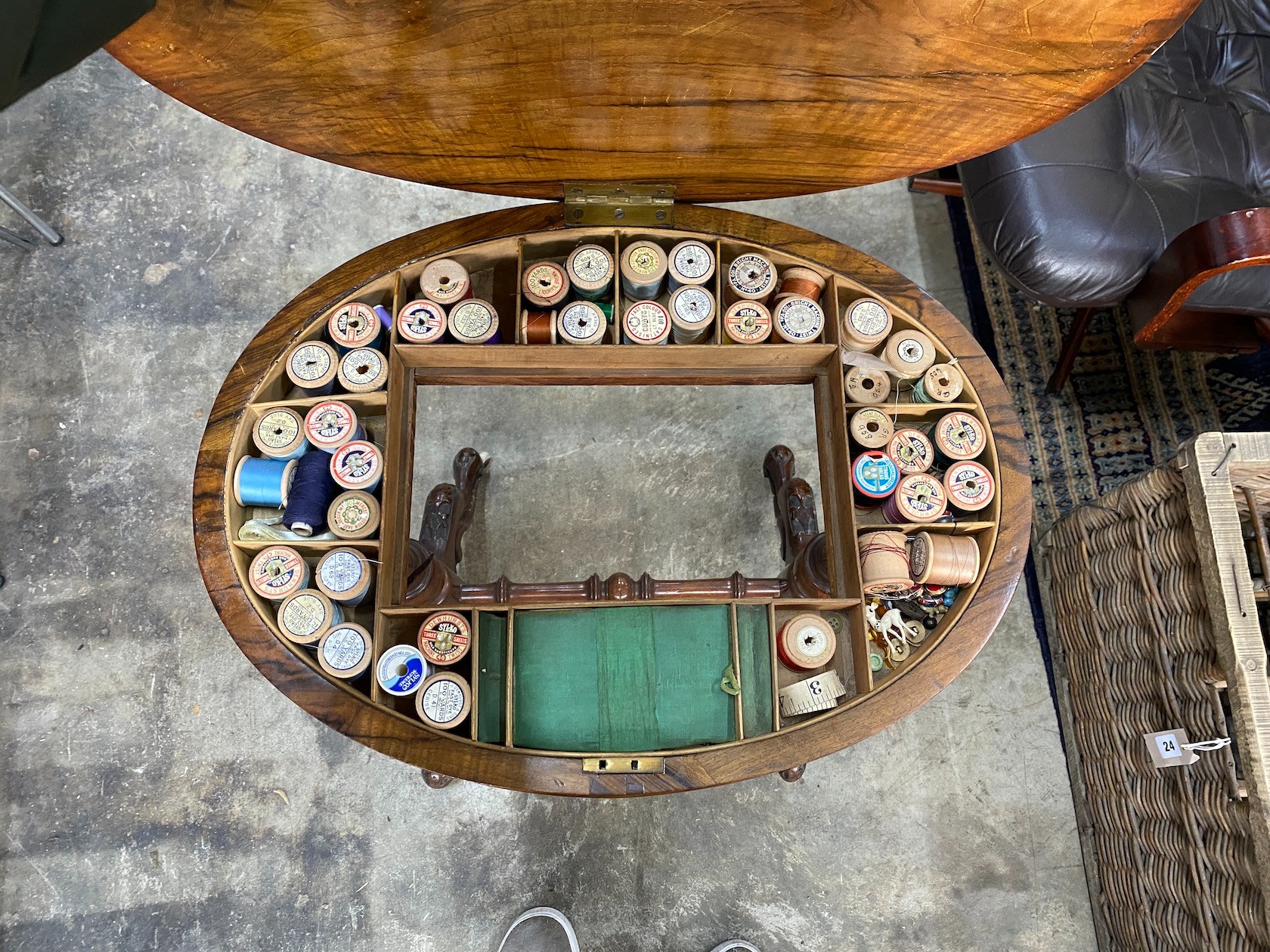 A Victorian oval marquetry inlaid walnut work table (missing basket), width 56cm, depth 42cm, height 71cm